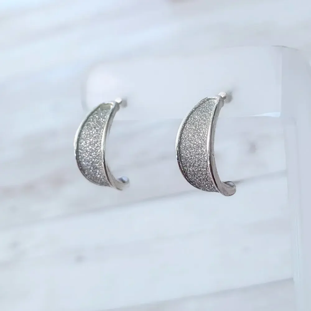 Curved Glittery Silver Tone Stud Earrings